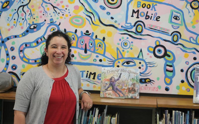 Megan Broome/The Clayton Tribune. Dyana Costello Banks is the new Library Manager at the Rabun County Public Library. Her first day was May 24. She said her mission is to be hands-on with patrons and interact with them as they browse for books to maximize a positive experience at the library.