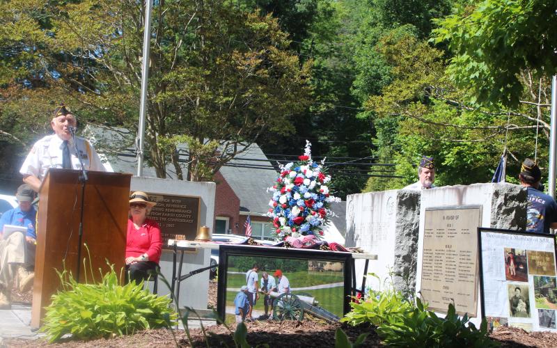 Megan Broome/The Clayton Tribune. Doug Wayne, S.V. Cdr. Chapter 15, is the master of ceremonies at the Memorial Day ceremony at the Rabun County Courthouse on Monday. The annual event honors veterans who have passed away.