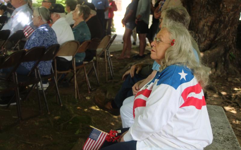 Megan Broome/The Clayton Tribune. Kelly Gipson attends Monday’s Memorial Day ceremony decked out in red white and blue to honor veterans who have passed away.