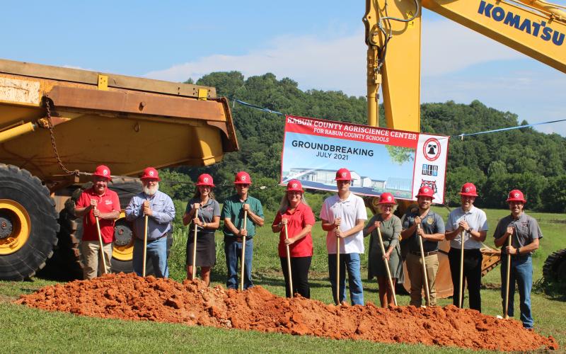 Megan Broome/The Clayton Tribune. Rabun County High School broke ground on its Agricenter last Thursday. It will be the future home of the Rabun County Future Farmers of America (FFA). At the groundbreaking were Board of Education members Wayne Stephens, left, Mark Beck, Molly Lima, Chairman Steve Cabe, Superintendent April Childers, Vice Chair Curt Haban, CTAE director Tammie West, High School FFA Advisor Dillon Parker, RCHS Principal Justin Spillers and Director of Plant Operations Jason Hogan.