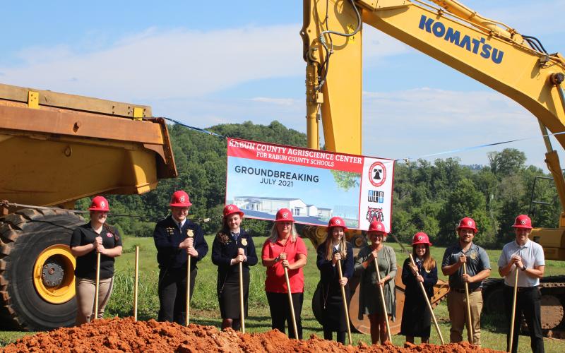 Megan Broome/The Clayton Tribune. Rabun County High School broke ground on its $7 million Agricenter last Thursday. The 31 acres of land will be the future home of the Rabun County Future Farmers of American (FFA). At the groundbreaking were Christy Dills, middle school FFA advisor, Carson Carpenter, FFA vice president, Emilly Abbott, FFA president, Melanie Beck, FFA historian ,and Haley Cross, FFA student.