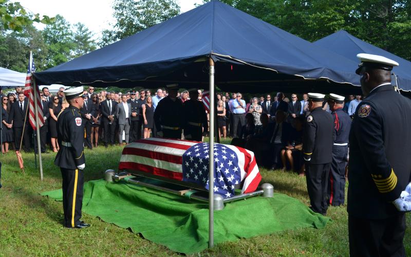 Wayne Knuckles/The Clayton Tribune. More than 200 people attended the graveside service for Chandler Breck Patterson Friday at Betty's Creek Baptist Church.