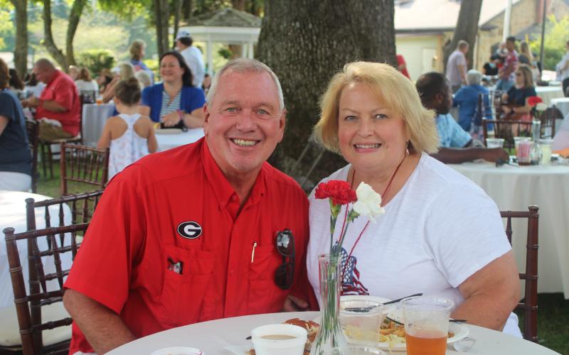 Megan Broome/The Clayton Tribune. Garrison Baker and Susan Baker from Cleveland attend the Fourth of July event at The Dillard House on Sunday.