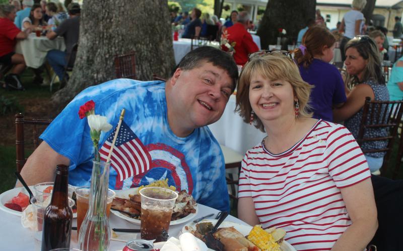 Megan Broome/The Clayton Tribune. Megan Broome/The Clayton Tribune. Archie Tabor and Stephanie Tabor enjoy a cookout and live entertainment at The Dillard House on Sunday to celebrate Independence Day.