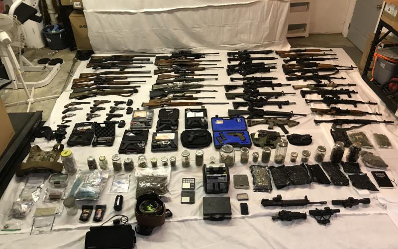 Photo courtesy of the Rabun County Sheriff’s Office. A search warrant executed by the RCSO at a residence in Rabun Gap resulted in the seizure of multiple suspected narcotics, numerous firearms and a large amount of ammunition. The DNR was also called to assist with wildlife remains. Three people were arrested as a result of the investigation.