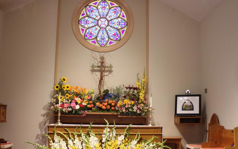 Megan Broome/The Clayton Tribune. The Liturgical Arts were part of the display at the 14th annual Flower Festival at St. James Episcopal Church on Saturday. The theme was “God’s Creation: Behold, I make all things new.”