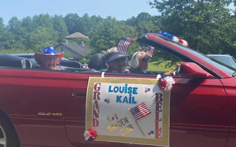 Submitted photo. The Sky Valley Garden Club celebrates member Louise Kail, who just turned 100, in Sunday’s festive Sky Valley parade.