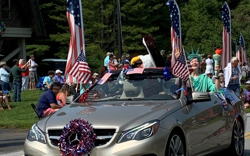 Submitted photo. Jim Curtis, dressed as an American Eagle, left, and Debbie Dalhouse, dressed as Ms. Liberty, are the Grand Marshals of the 2021 Sky Valley Independence Day parade. The parade had over 35 entries.