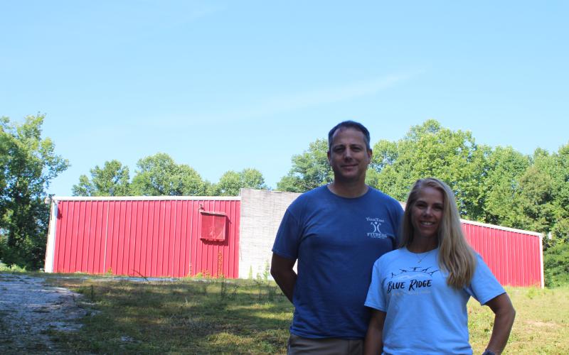 Megan Broome/The Clayton Tribune. Stephen Flaherty, left, and Suzie Nixon Flaherty along with partners Dorothy Welch and Rob Hamrick recently purchased the Mountain City Playhouse in an effort to restore it and bring back traditional activities like roller skating, square dancing and clogging. The goal is to bring back the “heritage” of the area. Restorations are planned to be completed within six months to a year.