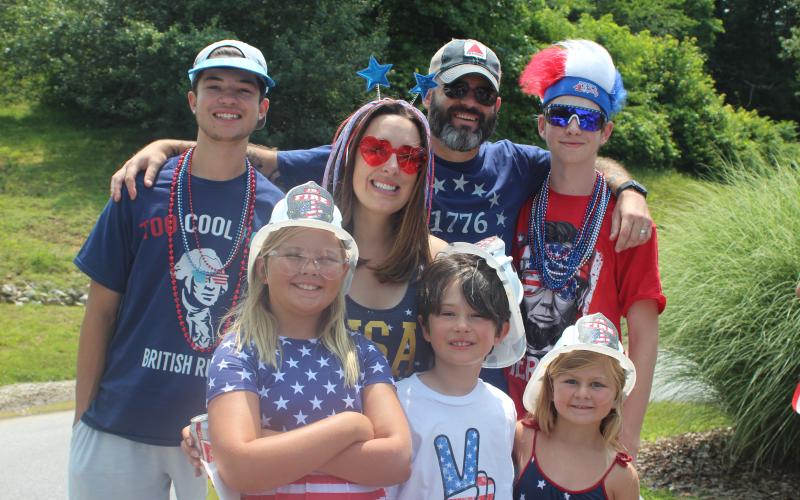 Megan Broome/The Clayton Tribune. Haden White, left, Angela White, Jeff White, Dawson White, Aubrey Ostrander, Logan White and Hailey Ostrander sport their red, white and blue in Sky Valley on Saturday.