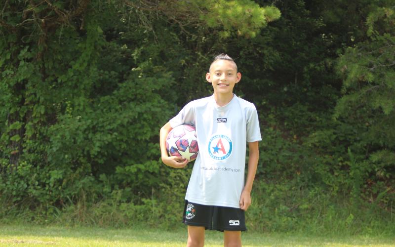 Megan Broome/The Clayton Tribune. Rabun County 11-year-old native Carlos Lopez-Justus was invited to spend 12 days in Italy to train with professional soccer coaches after attending a summer camp at the Atlanta Calcio Academy (ACA) in Habersham. Out of 34 players in the 12U group at the camp, he was the only player to be invited to Italy.