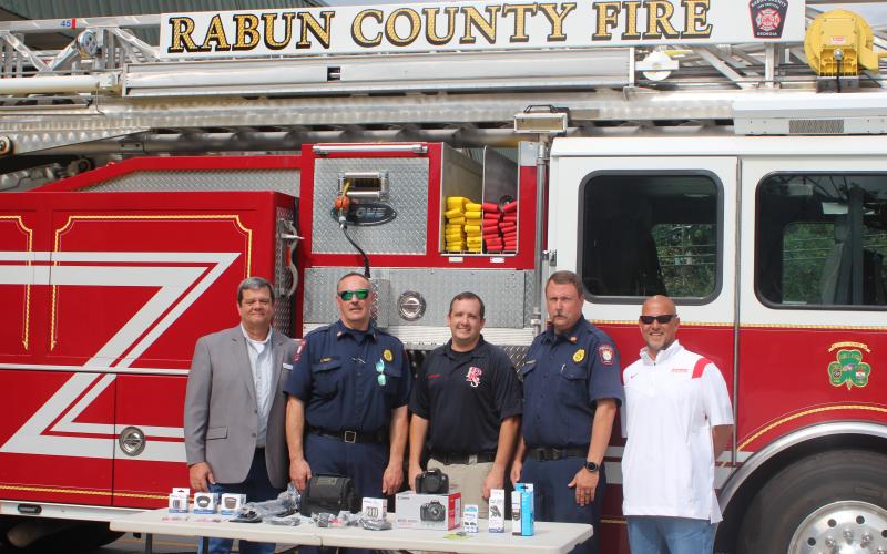 Megan Broome/The Clayton Tribune. From left are Kenneth LeCroy, consultant for Georgia Arson Control, Fire Chief James Reed, Lt. Ryan Bramblett, fire investigator for Rabun County, Assistant Fire Chief Justin Upchurch and Commissioner Scott Crane.