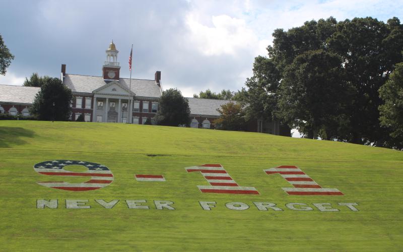 Megan Broome/The Clayton Tribune. Rabun Gap-Nacoochee School is remembering Sept. 11 with a tribute display on the front hill of the school.