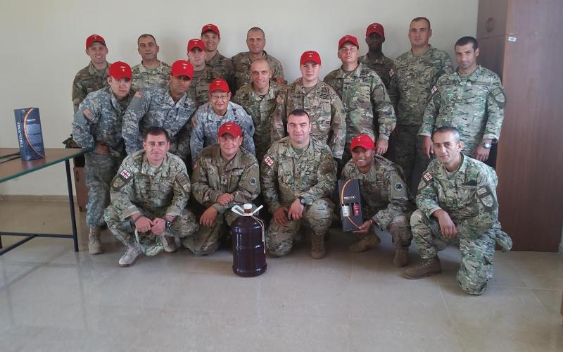Submitted photo.  165th QM Parachute Riggers in the Republic of Georgia with local Georgian Soldiers.