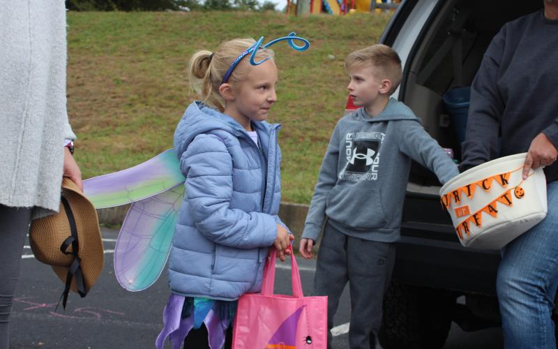 Megan Broome/The Clayton Tribune. Georgia Frankum, 7, left, and Ezra Jones at the Trunk or Treat last Saturday.