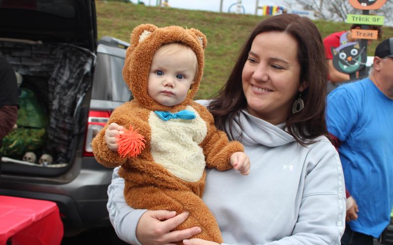 Megan Broome/The Clayton Tribune. Tiffany English takes 10-month-old Tatum English Trick or Treating at last Saturday’s Trunk or Treat.