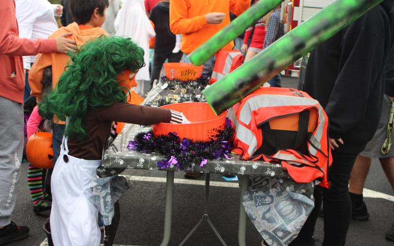 Megan Broome/The Clayton Tribune. Jasper Turpin, 5, Trick or Treats last weekend.