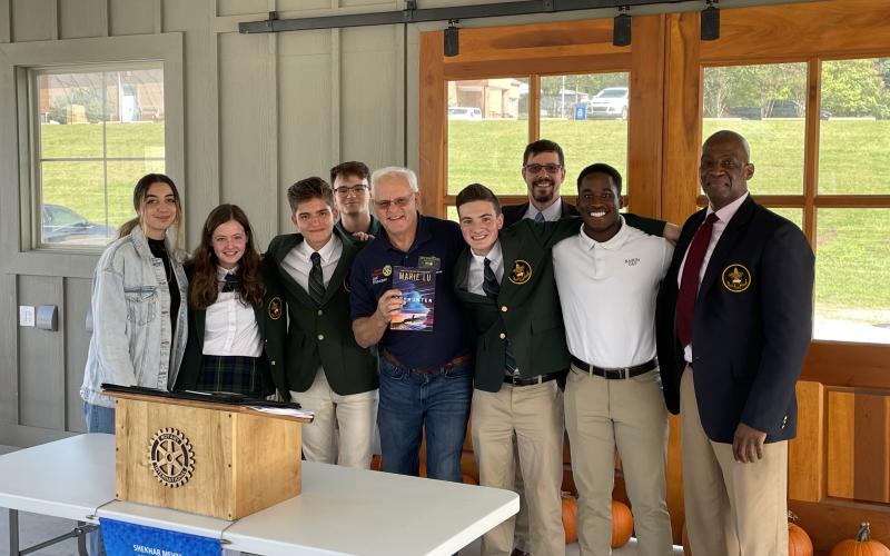 Students at Rabun Gap-Nacoochee School attend the Clayton Rotary Club meeting Oct. 14 to talk about their progress working with mentor Mason West III  in a program that allows students to work with peers in Egypt to tackle global challenges. Pictured (from left) are Ana Baptista; Juliette Teutsch; Omar Zermenonunez; Brady Roulier; Jef Fincher; Rotary Club of Clayton President Edwin Wood; Eric Vogelbacher; Rotarian, Assistant Director of Development for Rabun Gap-Nacoochee School Donell Irungo;Mason West III