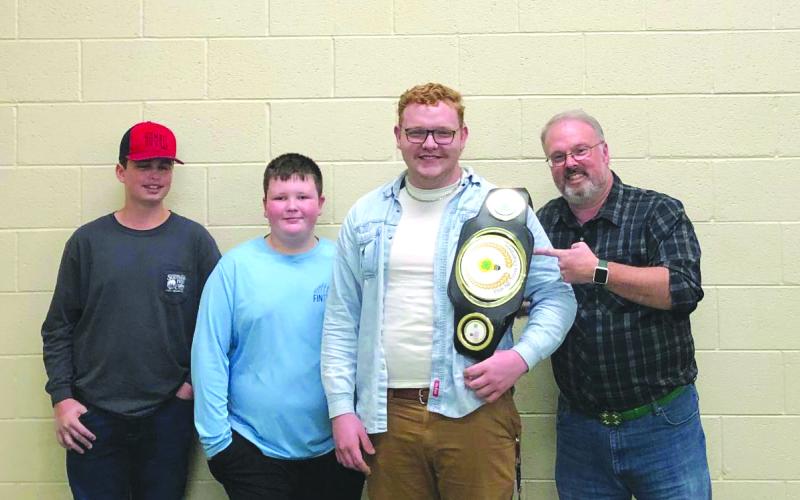Photo courtesy of Rabun County 4-H. Pictured (from left) are Rabun County 4-H winners fo the Northeast District Contest Peyton Hicks, Jacob Burrell and Carson Carpenter with Rabun County 4-H Educator Joey Eller.