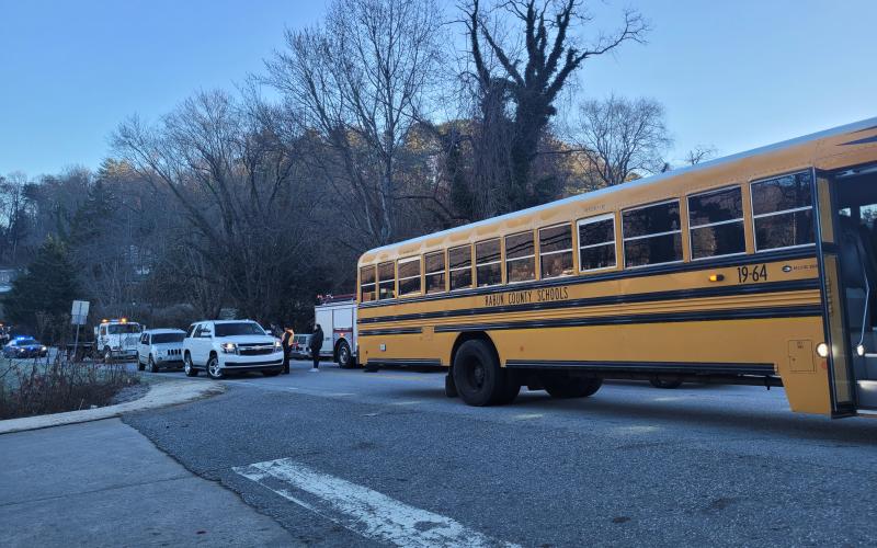 Megan Broome/The Clayton Tribune. A Rabun County school bus was involved in a four-vehicle accident in Clayton Monday morning. No injuries were reported from the accident. A Clayton man is charged with DUI and failure to maintain lane as a result.