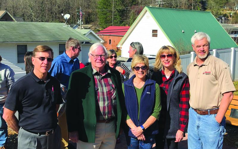 Tony Penrose/The Clayton Tribune. The Clayton DDA held a dedication of the Charlie Mac Dickerson Memorial Park Dec. 1, with city officials and community members in attendance. The park was established to honor Dickerson, who was a local business owner and community member dedicated to service. Pictured are DDA members Greg Funkhouser, left, Pepper Kelly, Cassandra Clouser, chair, Karen Bacon and Vaughn Rogers.