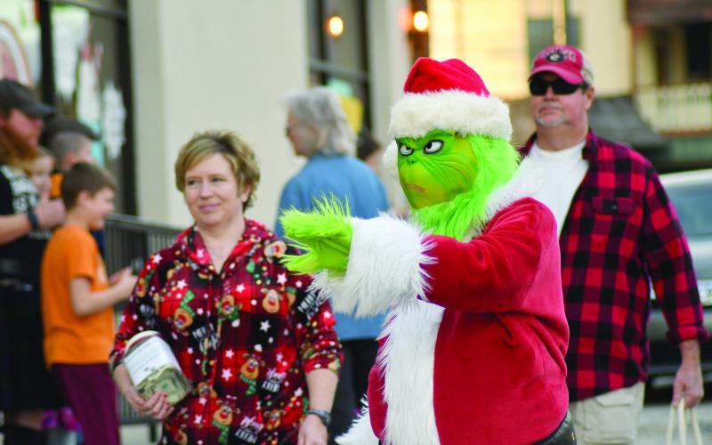 Enoch Autry/The Clayton Tribune. The Grinch helped raised money for local animals.
