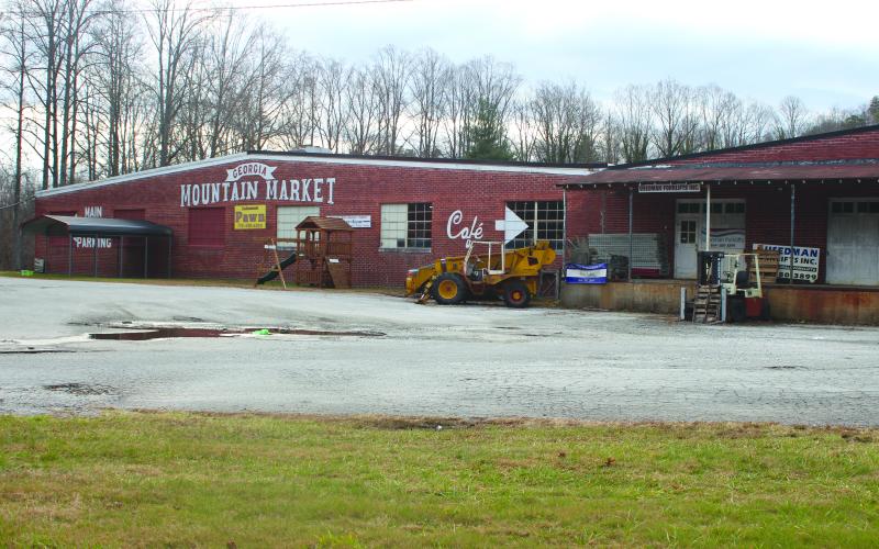 Megan Broome/The Clayton Tribune. MedLink Georgia has bought the Georgia Mountain Market building. The 75,000-square-foot structure with 12 acres currently houses the indoor flea market and other businesses. The building was originally established in 1952 as a factory producing garments.