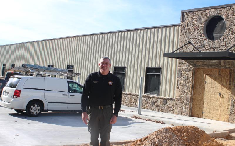 Megan Broome/The Clayton Tribune. Sheriff Chad Nichols stands in front of the new Rabun County Sheriff’s Office building on Bowen Creek Rd. in Tiger as it is under construction. The facility is located across the street from the Rabun County Detention Center. The project is funded with monies from the 2019 Special Purpose Local Option Sales Tax (SPLOST).
