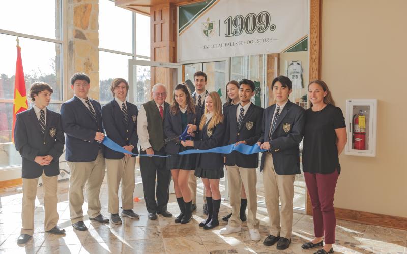 Photo courtesy of Tallulah Falls School. Colton Augustine (from left) are Yukun “Tom” Fu, Andrew Erwin, President and Head of School Larry A. Peevy, Mara Radovic, Milos Vico, Ashli Webb, Ninel Tarasova, Nafis Rahman, Zeyu Fang and teacher Jennifer Cox.