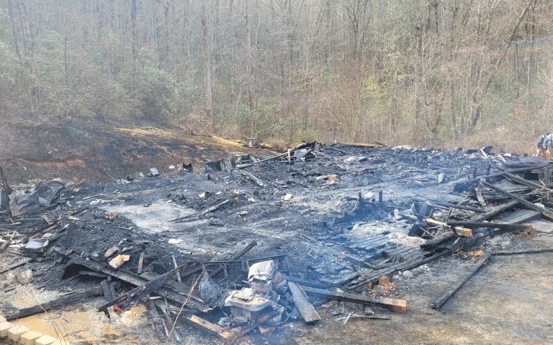 Megan Broome/The Clayton Tribune. A structure fire at 736 Western Way in Rabun Gap Jan. 13 resulted in two fatalities.