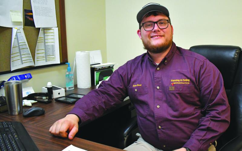 Enoch Autry/The Clayton Tribune. Shylan Wood started his job as Rabun County zoning administrator at the beginning of December.
