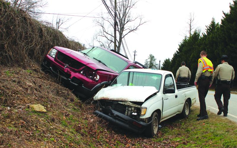 Megan Broome/The Clayton Tribune. Two vehicles collide on Georgia 15 on Jan. 13 as one of the occupants received minor injuries.