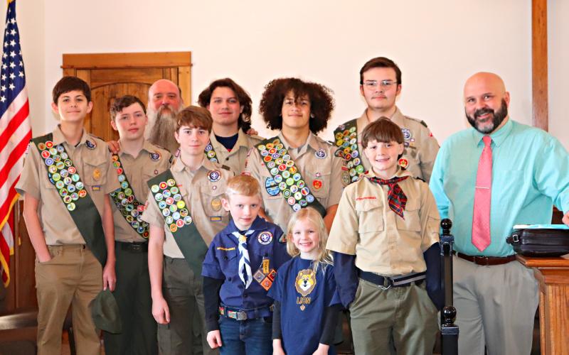 Photo courtesy of Lisa Broz. Picture are: (Front row) Emmit Watts, Brycen Deason, Jasmine Deason, and Garrett Gragg; (Back row) Chauncey Nalley, Quinn Weingartz, Scoutmaster Ron Broz, Alex Dixson, Ben McKissack, Liam Broz and Persimmon Baptist Pastor Avery Lawrence