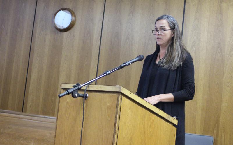 Megan Broome/The Clayton Tribune. Sarah Gillespie speaks to Rabun County Commissioners about the need for mental health resources in the community on behalf of Georgia Mountain Psychological Associates (GMPA) at the Commissioner meeting Tuesday.