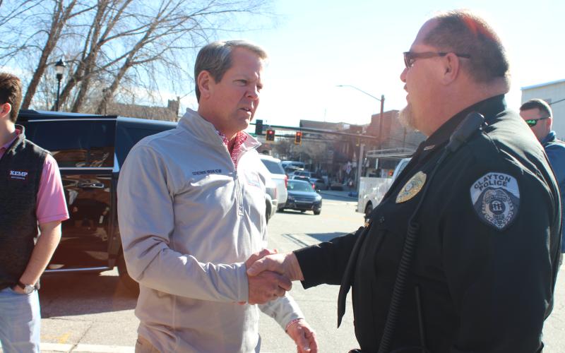 Megan Broome/The Clayton Tribune. Gov. Brian Kemp shakes Clayton Police Chief Andy Strait's hand during a meet-and-greet in Clayton Feb. 18.