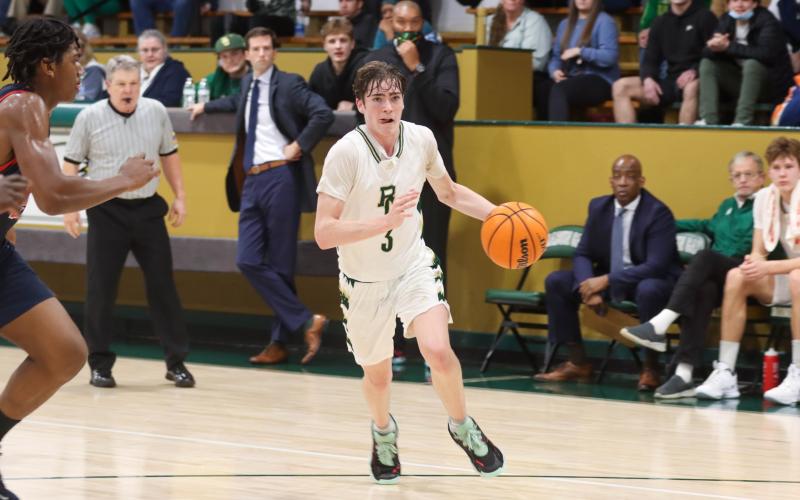 RGNS Athletics. RGNS Eagle Theo Antinori charges to the basket at home.