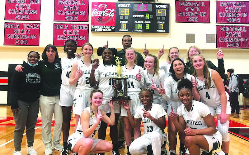 TFS Athletics. The Tallulah Falls Lady Indians proudly display the girls basketball program’s first-ever region tournament championship Tuesday night after a 47-38 win against Prince Avenue Christian at George Walton.
