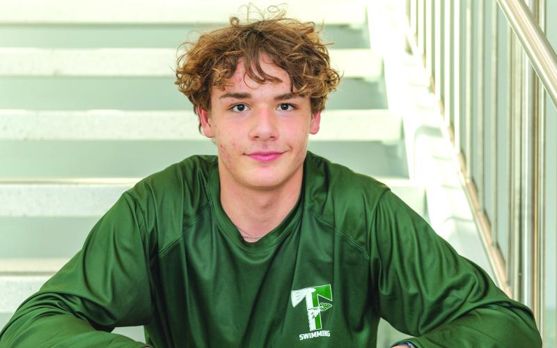 Photo by E. Lane Gresham. Emre Sungur, a freshman from Turkey, excels in pool for TFS.
