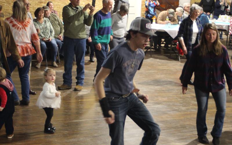 Megan Broome/The Clayton Tribune. Cade Vissage dances his heart out at the soft opening of the Mountain City Playhouse last Saturday.