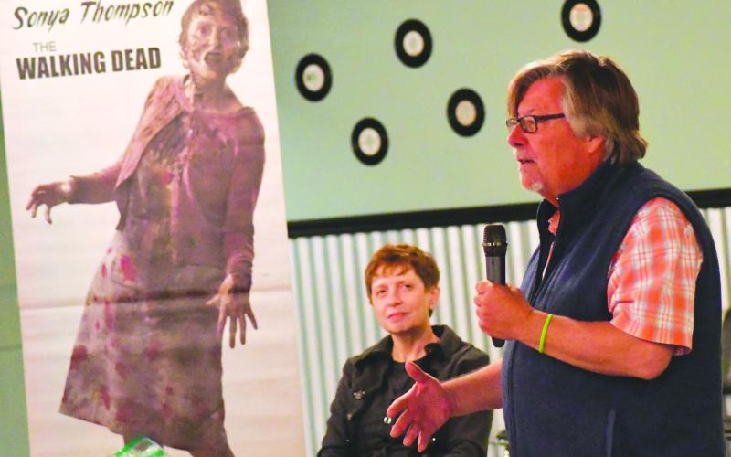 Enoch Autry/The Clayton Tribune. Dr. John Stamey talks to the audience at the Georgia Bigfoot Conference preparty on April 7 at the Rabun County Civic Center in Clayton. The conference is slated for Saturday, April 16, at the civic center. In the background is Sonya Thompson who has acted as a zombie on “The Walking Dead” TV show.