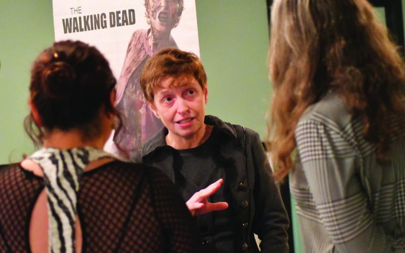 Enoch Autry/The Clayton Tribune. Sonya Thompson, who played the role of a zombie in “The Walking Dead” during the television show’s first two seasons, talks to those in attendance at the April 7 Georgia Bigfoot Conference preparty. The conference will be Saturday in Clayton.