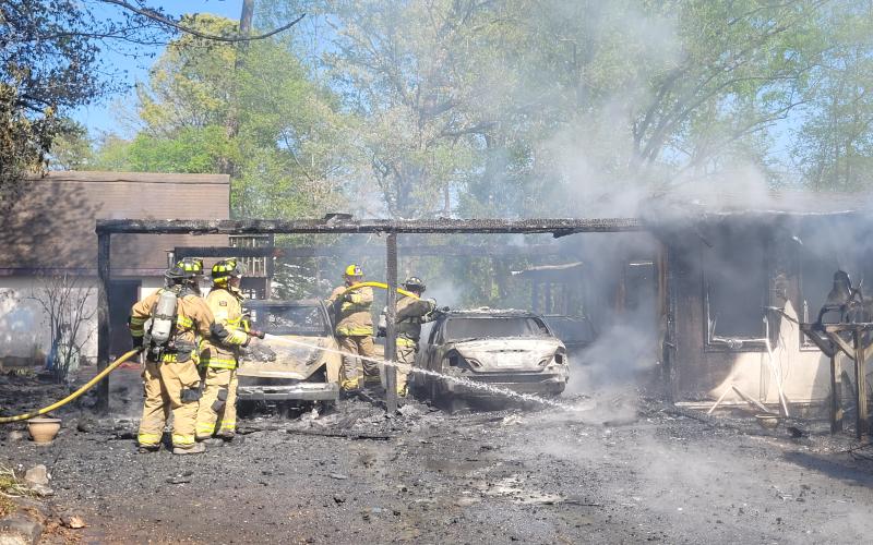 Megan Broome/The Clayton Tribune. Multi-agencies in Rabun County responded to a structure fire on Stekoa Falls Rd. in Clayton Wednesday afteroon.