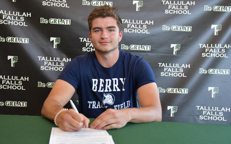 Photo courtesy Elisha Boggs. George Ketch signs with Berry College track and field.