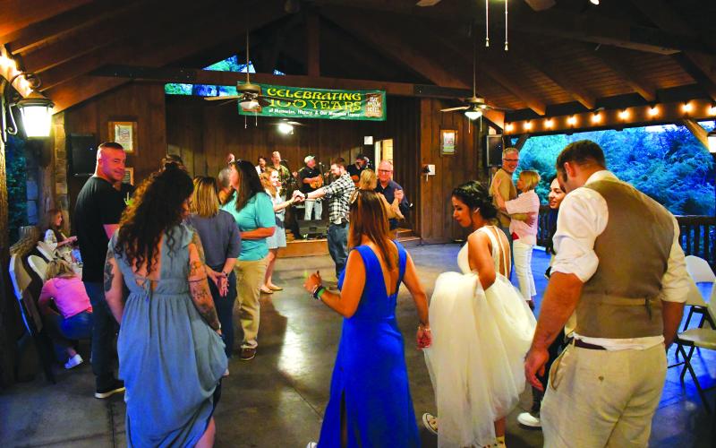 Enoch Autry/The Clayton Tribune. Guests head to the dance floor to celebrate the 100th anniversary of Lake Rabun Hotel.