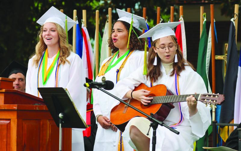 Photo courtesy RGNS. Lucy Barry of Rabun Gap, Ga., Eryn Blakeley of St.Micheal, Barbados, and Laura Grace Schmeichel of Palmetto, Fla., perform.