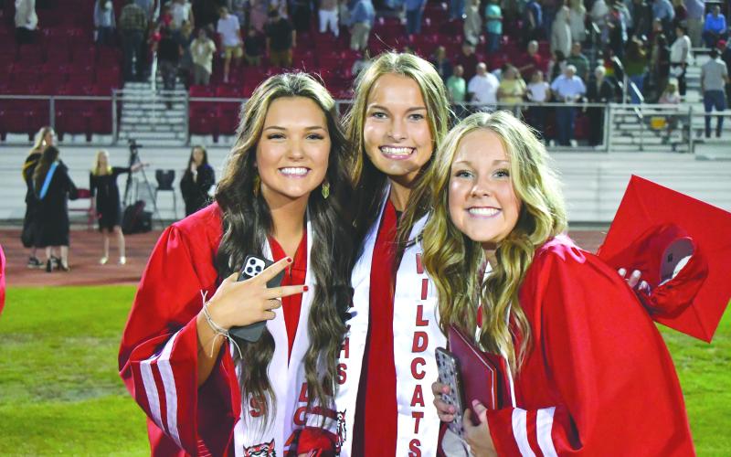 Enoch Autry/The Clayton Tribune. Honor graduates Sophia Woodard, Carley Haban and Loren Stiles are all smiles.
