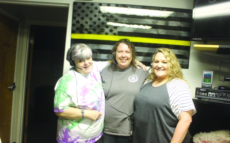 Megan Broome/The Clayton Tribune. Corrie Turpin, Becky Dryman and Kenette Turner are dispatchers at Rabun County 911 and are dedicated to serving their community. Rabun County 911 Dispatch is the first point of contact during emergencies.