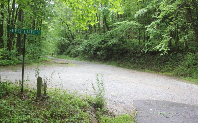 Megan Broome/The Clayton Tribune. Evergreen Road meets Sheep Cliff Way. The City of Sky Valley will soon begin paving Evergreen Road following approval by Council Members in May.