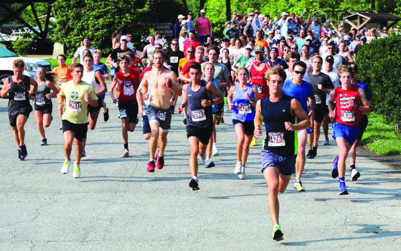 Photo courtesy of  Melissa Elzey. Runners begin last year’s Lake Burton Fun Run at the Moccasin Creek pavilion in Clarkesville. Annually, a total of 1,250 participate.