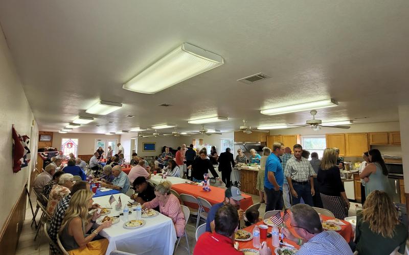 Megan Broome/The Clayton Tribune. Congregation and guests at Bethel Baptist Church in Tiger enjoy food and fellowshipping on July 17 to celebrate the 130 Anniversary of the church. Attendees enjoyed a special program and food following the service.